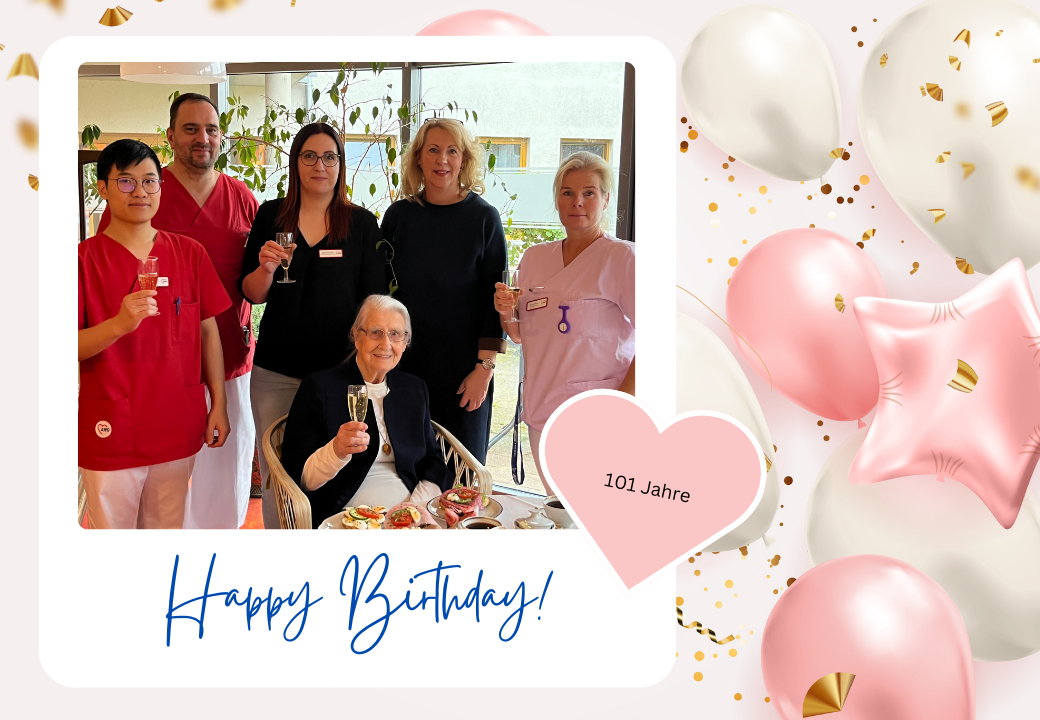 Eine Gruppe von Menschen feiert den 101. Geburtstag einer älteren Frau.