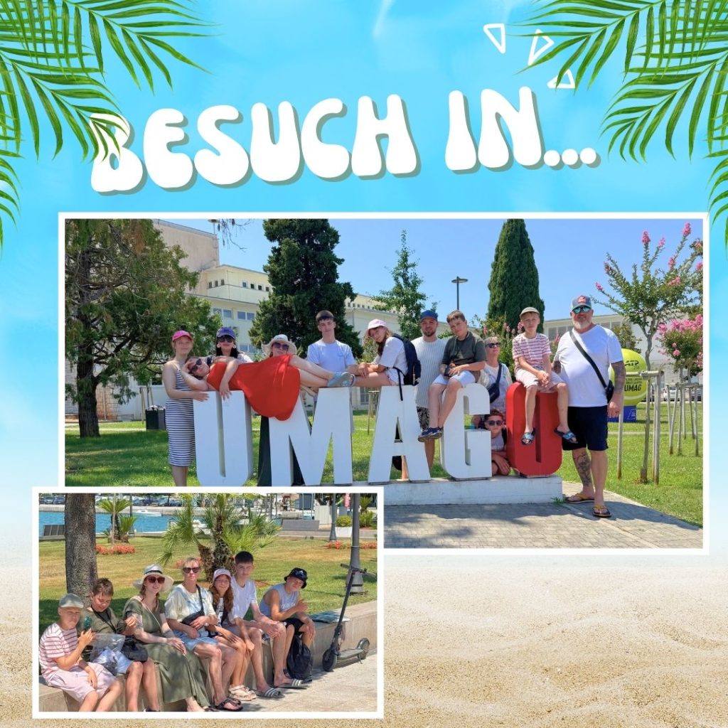 Gruppe vor UMAG-Schriftzug