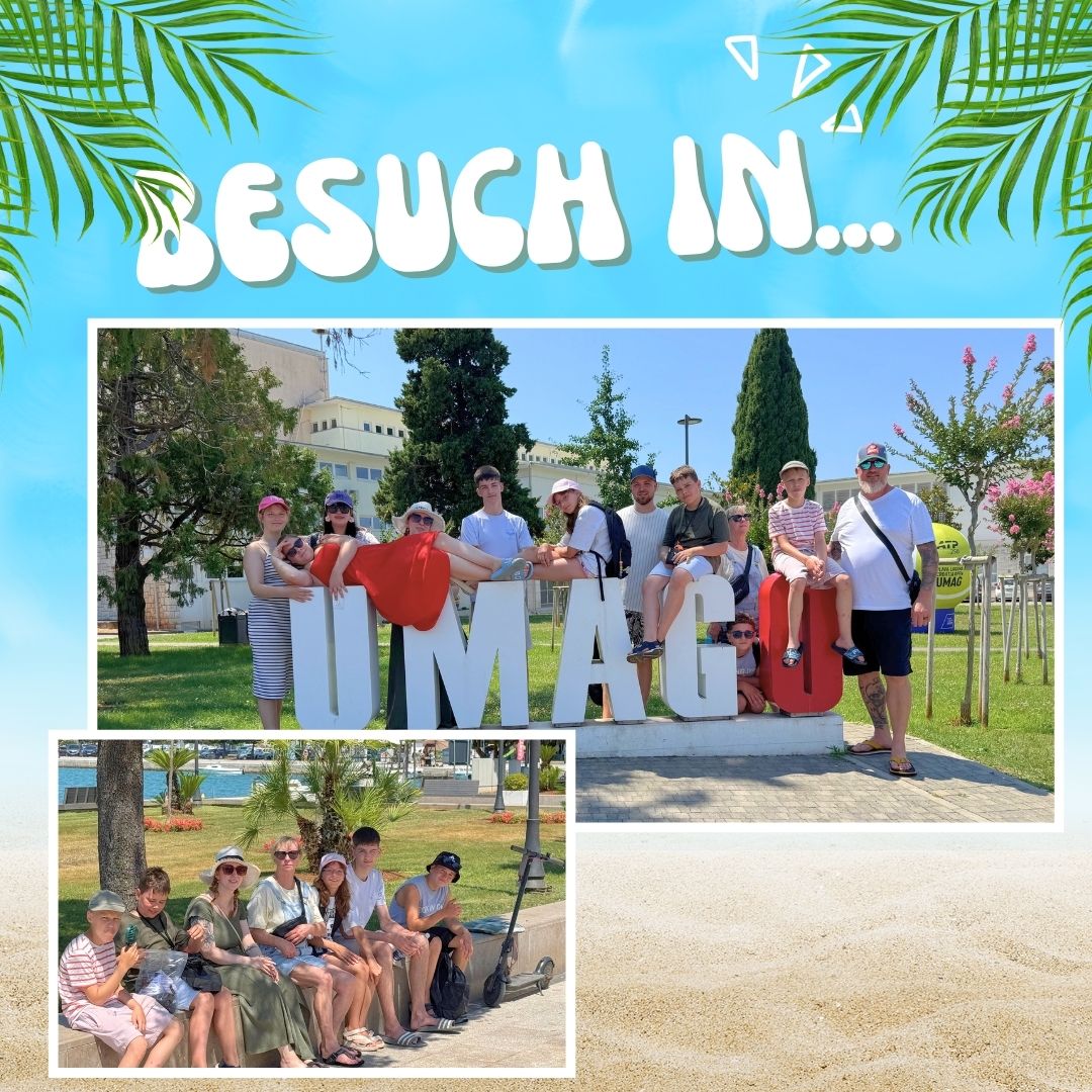 Gruppe vor UMAG-Schriftzug